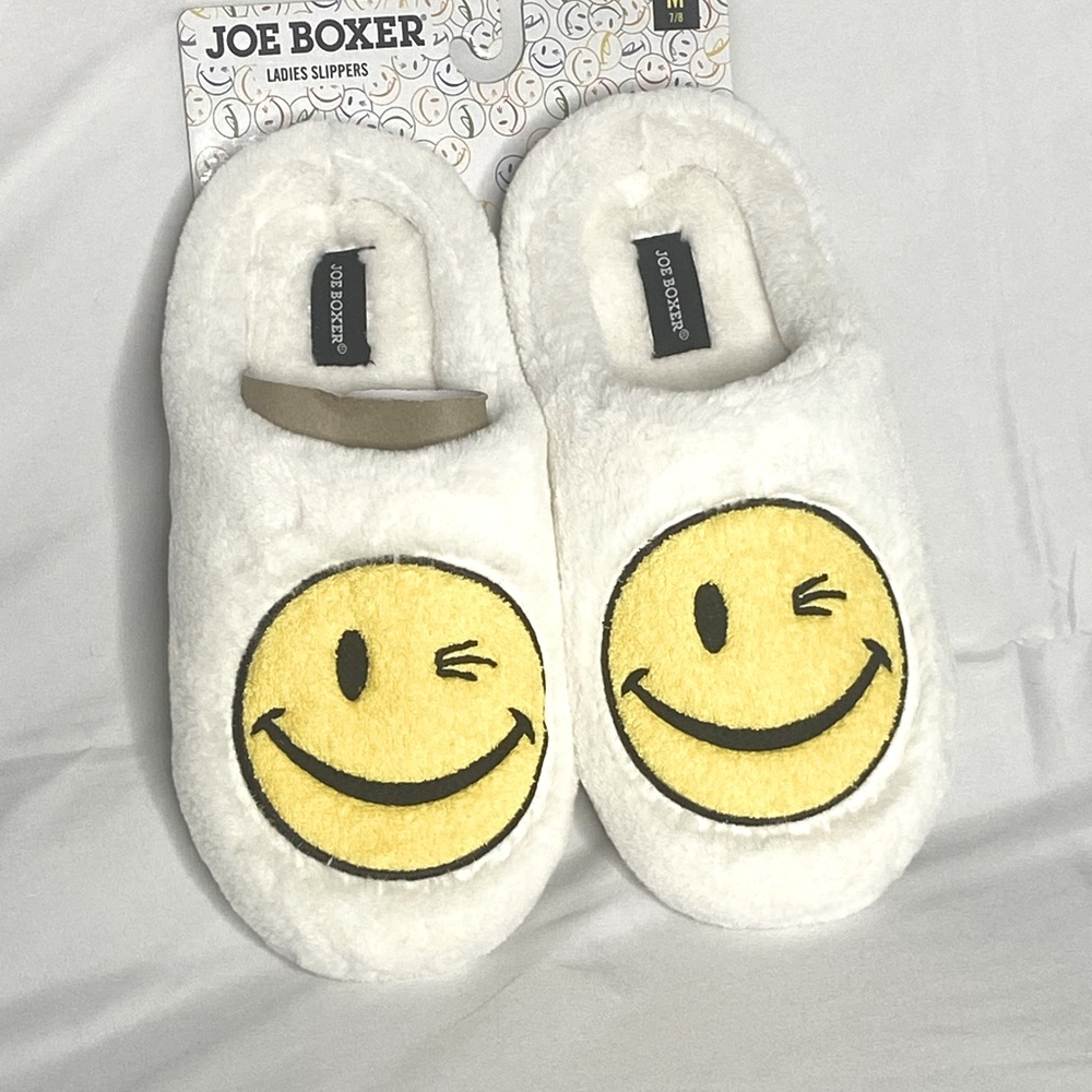 The brand is joe boxer size is 7 color is white wit yellow smiley face.
